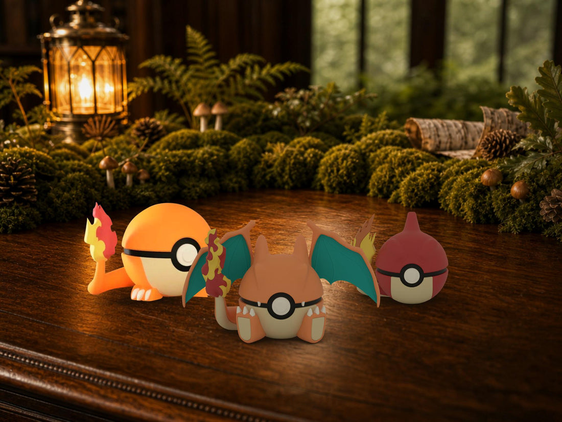 Charmander, Charmeleon and Charizard N3D Poké Balls on a woodland study desk, 3D printed Pokeball clicker evolution line