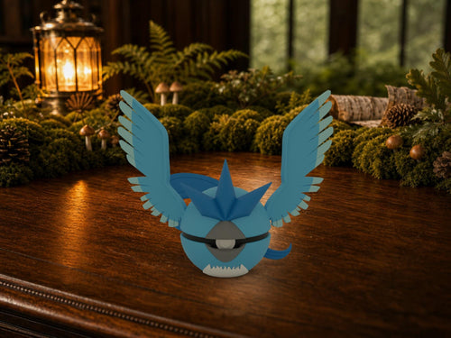 Articuno N3D Poké Ball #0144 on a woodland study desk, 3D printed Pokeball clicker