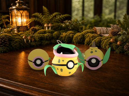Bellsprout, Weepinbell and Victreebel N3D Poké Balls on a woodland study desk, 3D printed Pokeball clicker evolution line
