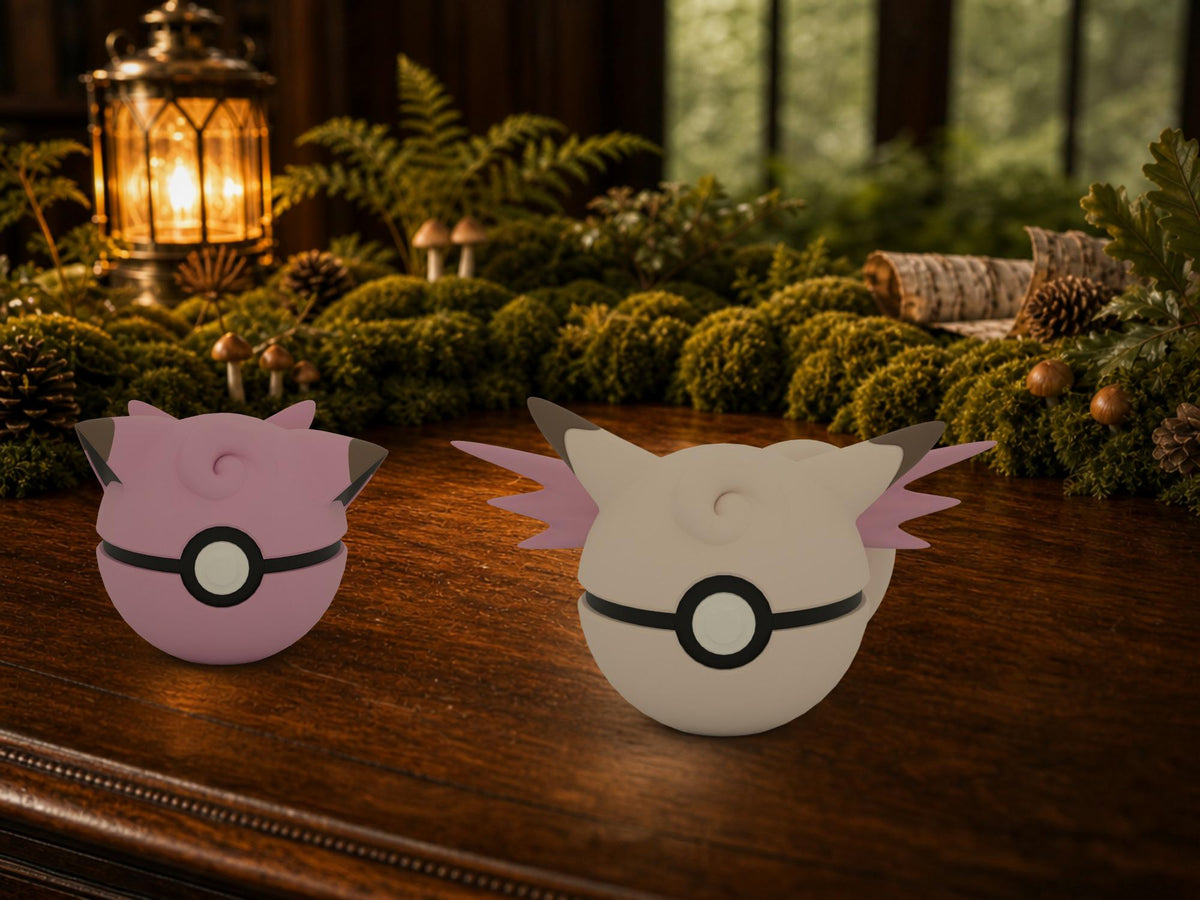 Clefairy and Clefable N3D Poké Balls on a woodland study desk, 3D printed Pokeball clicker evolution line