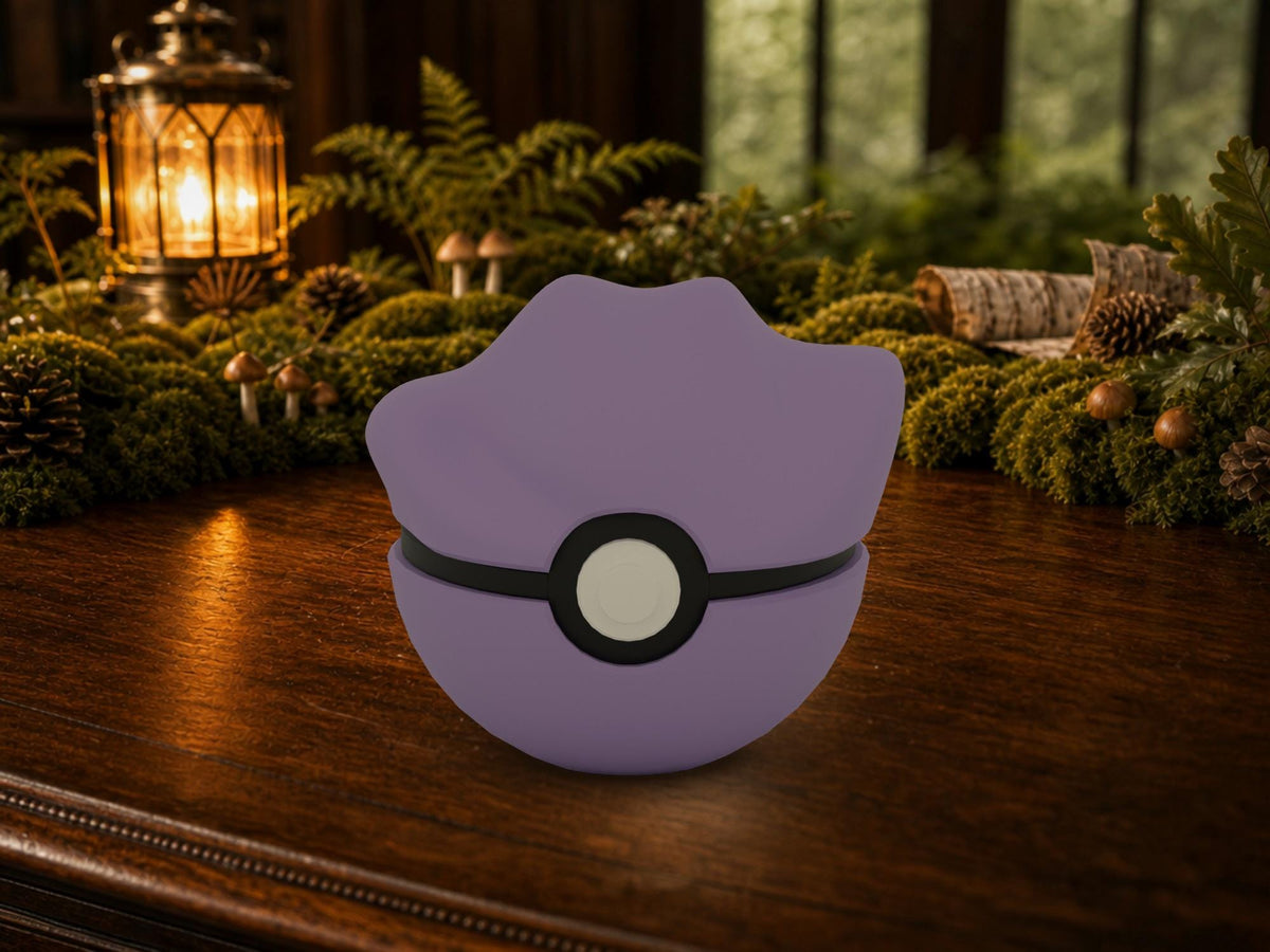Ditto N3D Poké Ball #0132 on a woodland study desk, 3D printed Pokeball clicker