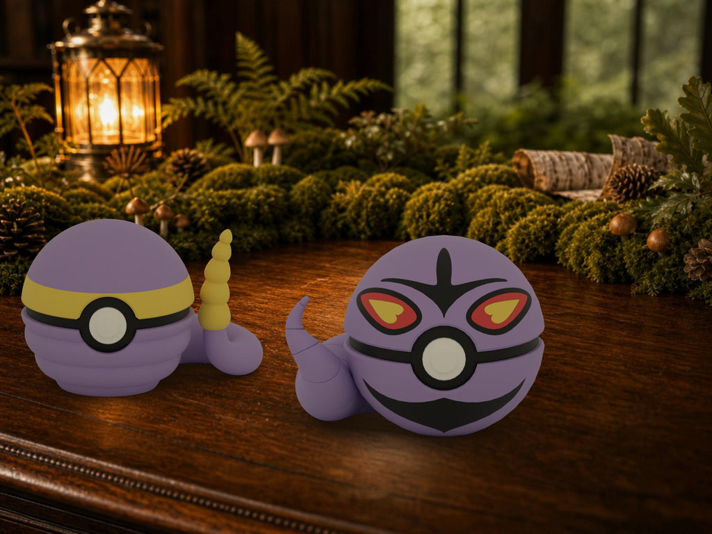 Ekans and Arbok N3D Poké Balls on a woodland study desk, 3D printed Pokeball clicker evolution line