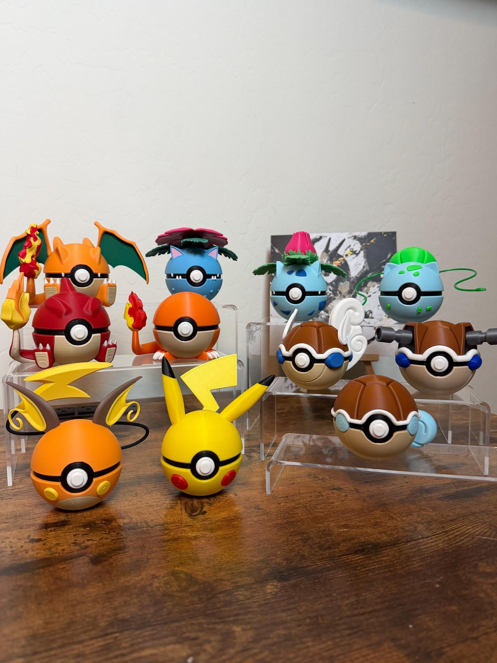 Real photo: Gen 1 starter N3D Poké Balls, 3D printed, Bulbasaur, Charmander, Squirtle and Pikachu lines on acrylic stands