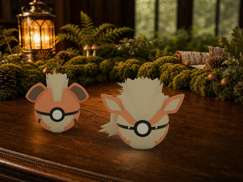 Growlithe and Arcanine N3D Poké Balls on a woodland study desk, 3D printed Pokeball clicker evolution line