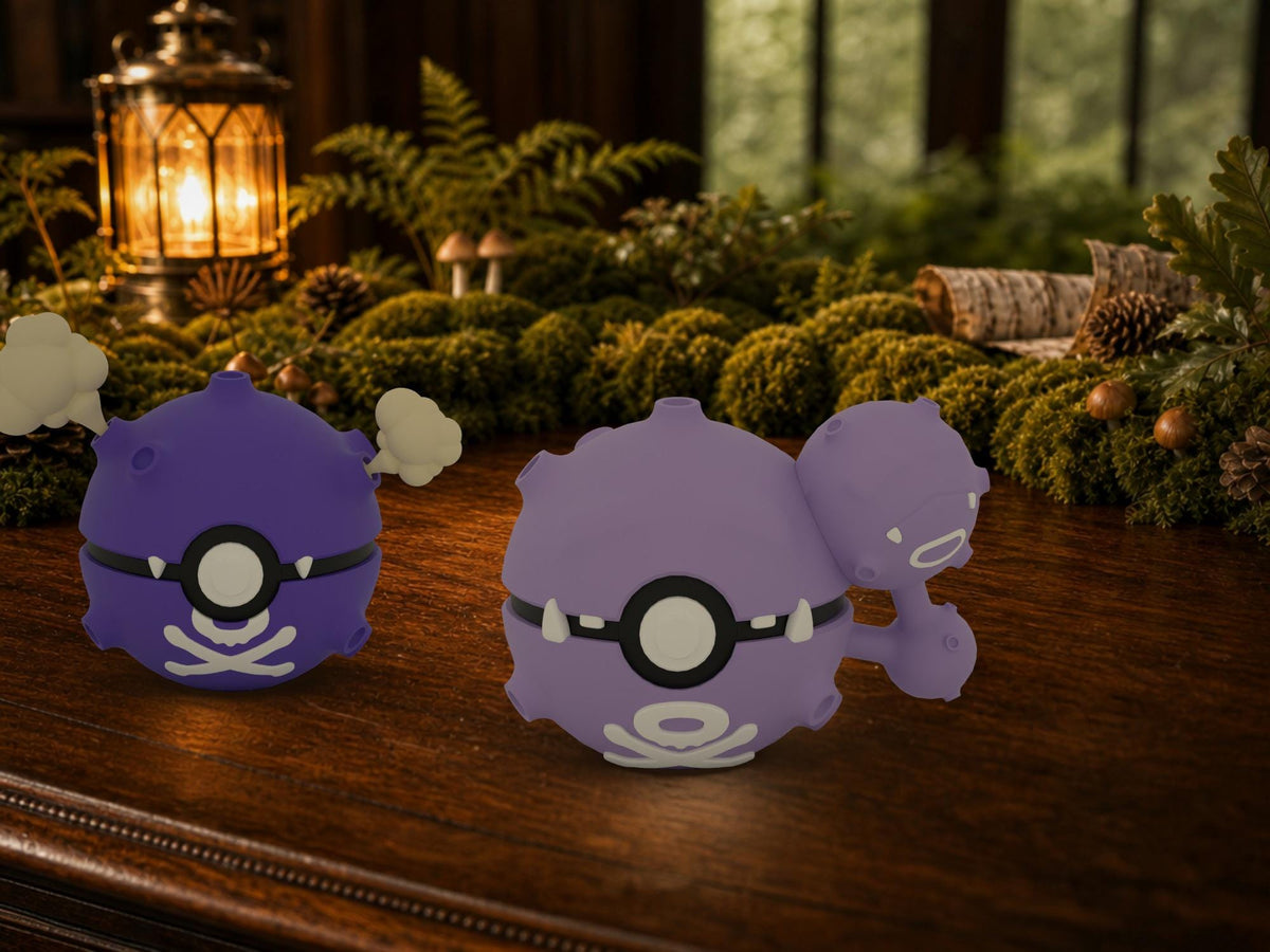 Koffing and Weezing N3D Poké Balls on a woodland study desk, 3D printed Pokeball clicker evolution line