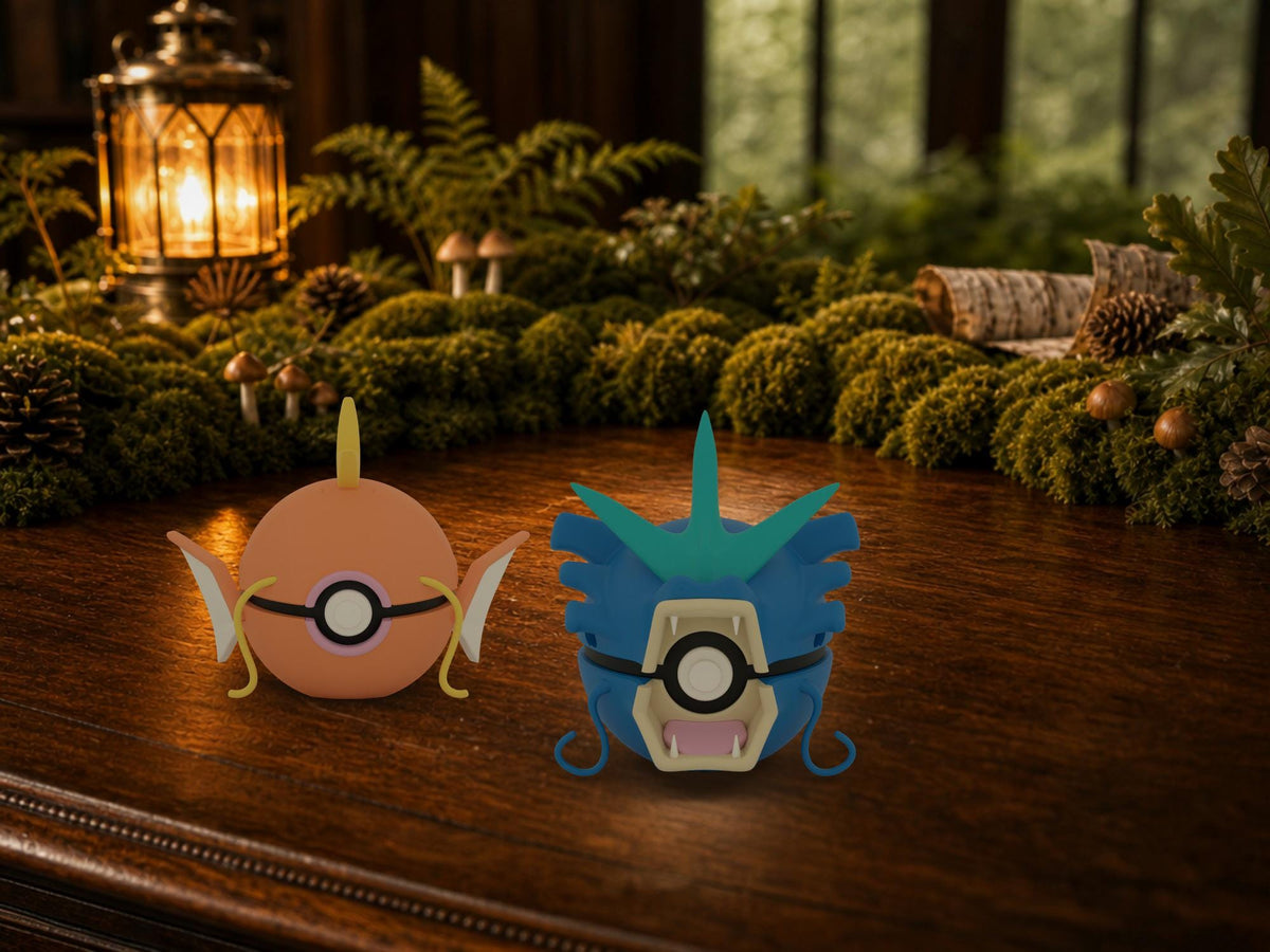 Magikarp and Gyarados N3D Poké Balls on a woodland study desk, 3D printed Pokeball clicker evolution line