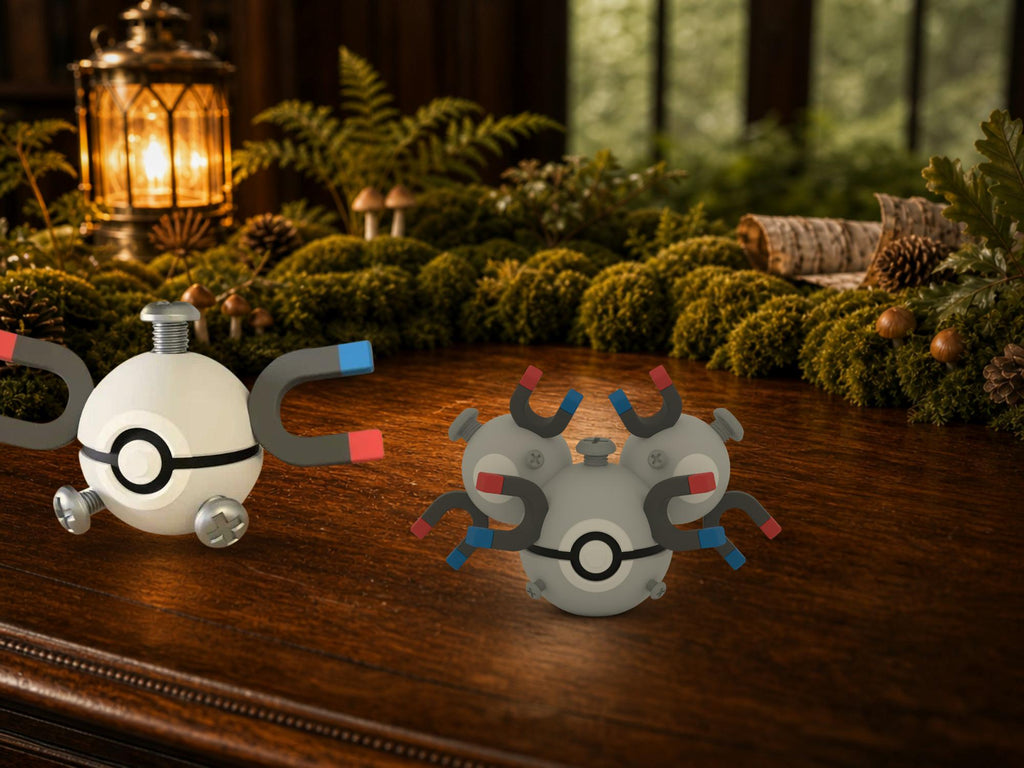 Magnemite and Magneton N3D Poké Balls on a woodland study desk, 3D printed Pokeball clicker evolution line