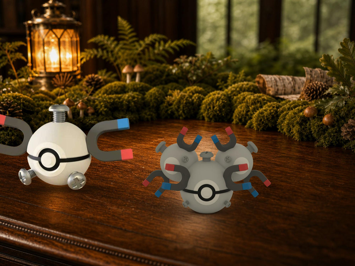 Magnemite and Magneton N3D Poké Balls on a woodland study desk, 3D printed Pokeball clicker evolution line