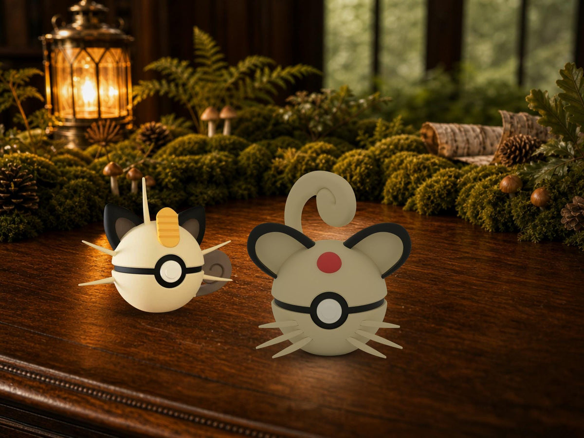 Meowth and Persian N3D Poké Balls on a woodland study desk, 3D printed Pokeball clicker evolution line