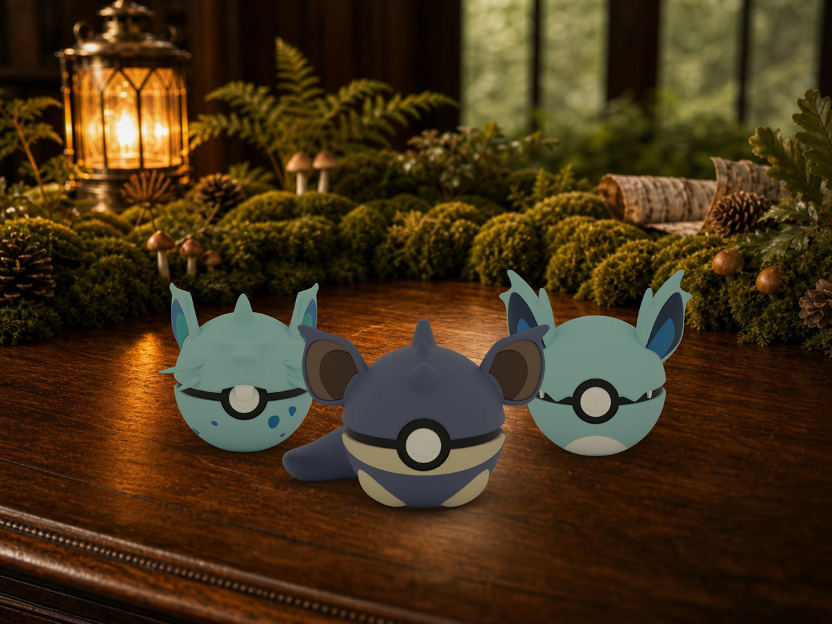 Nidoran♀ (Female), Nidorina and Nidoqueen N3D Poké Balls on a woodland study desk, 3D printed Pokeball clicker evolution line