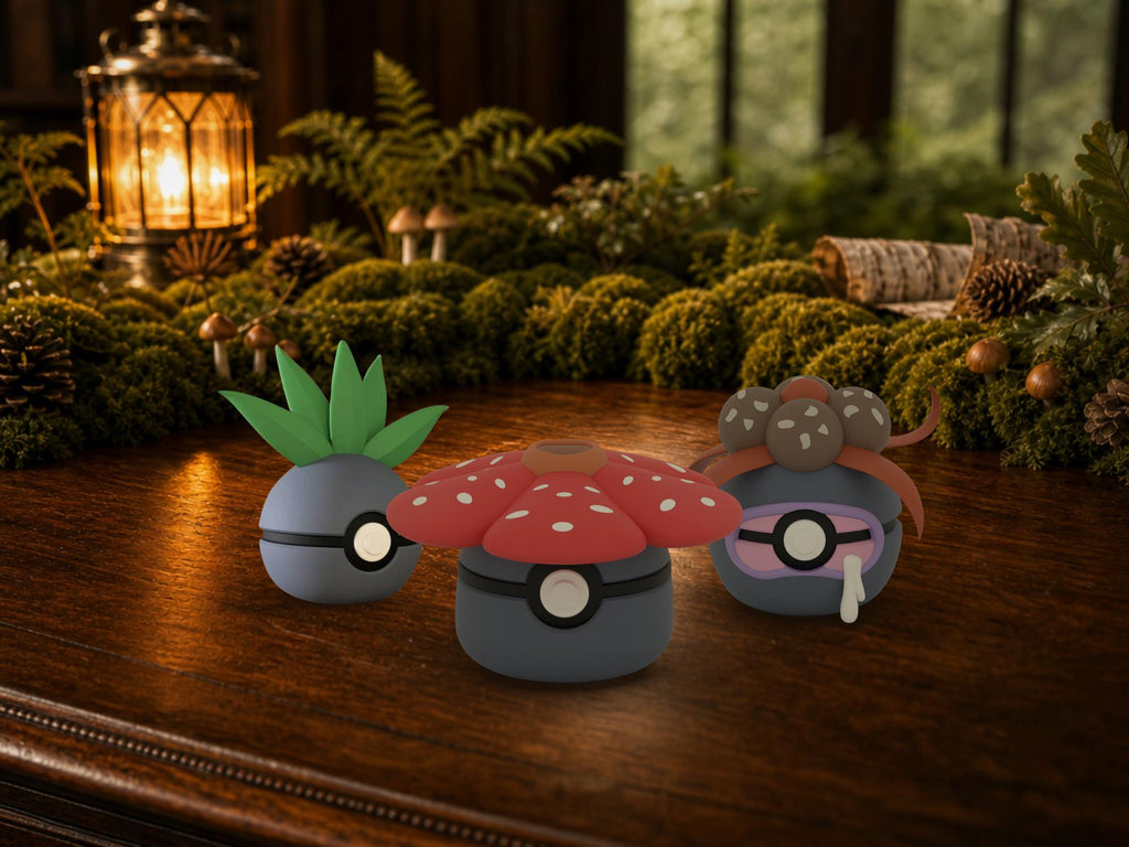Oddish, Gloom and Vileplume N3D Poké Balls on a woodland study desk, 3D printed Pokeball clicker evolution line