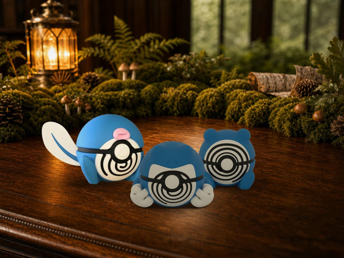 Poliwag, Poliwhirl and Poliwrath N3D Poké Balls on a woodland study desk, 3D printed Pokeball clicker evolution line