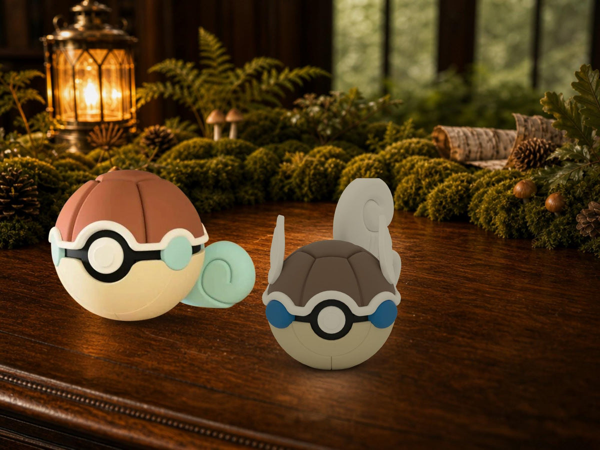 Squirtle and Wartortle N3D Poké Balls on a woodland study desk, 3D printed Pokeball clicker evolution line