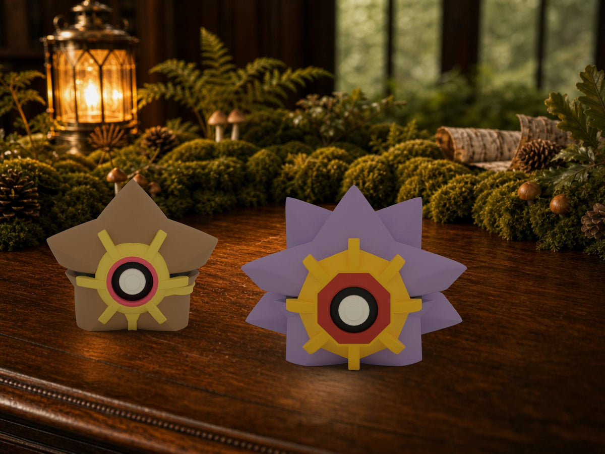 Staryu and Starmie N3D Poké Balls on a woodland study desk, 3D printed Pokeball clicker evolution line