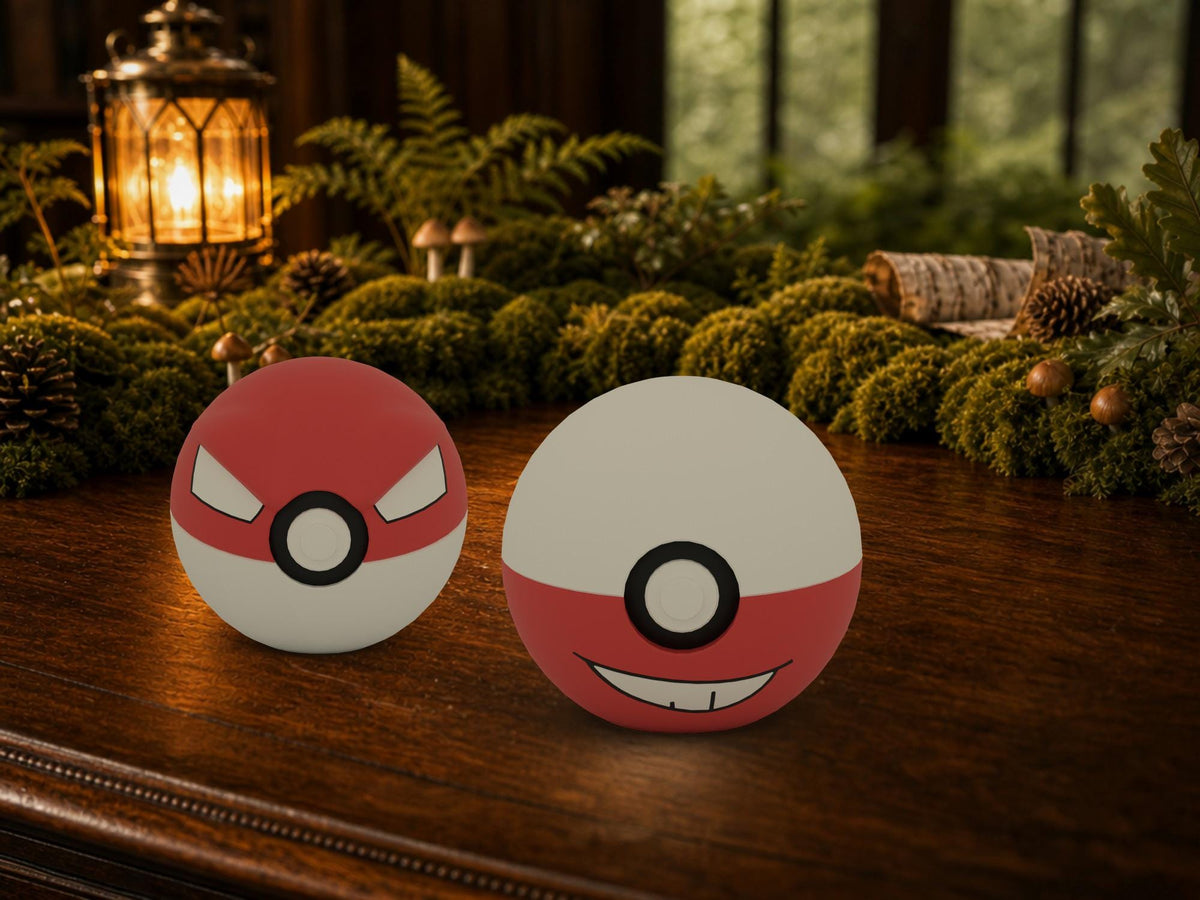 Voltorb and Electrode N3D Poké Balls on a woodland study desk, 3D printed Pokeball clicker evolution line