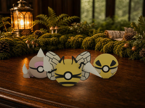 Weedle, Kakuna and Beedrill N3D Poké Balls on a woodland study desk, 3D printed Pokeball clicker evolution line
